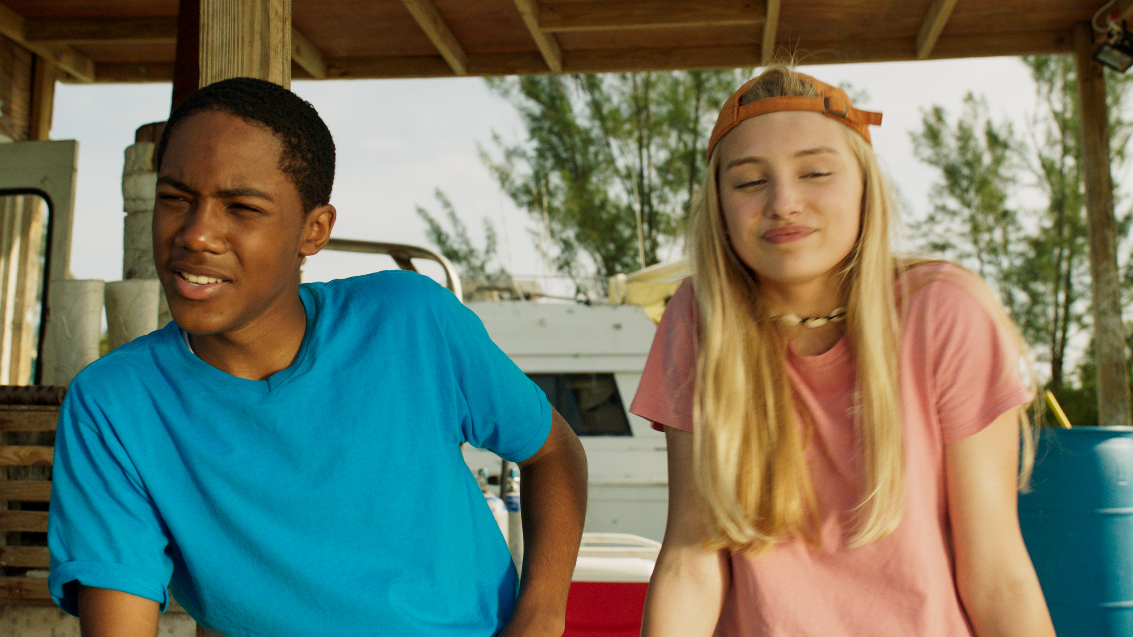 Aaron Burrows and Tyler Jade Nixon in Dolphin Island (2021)