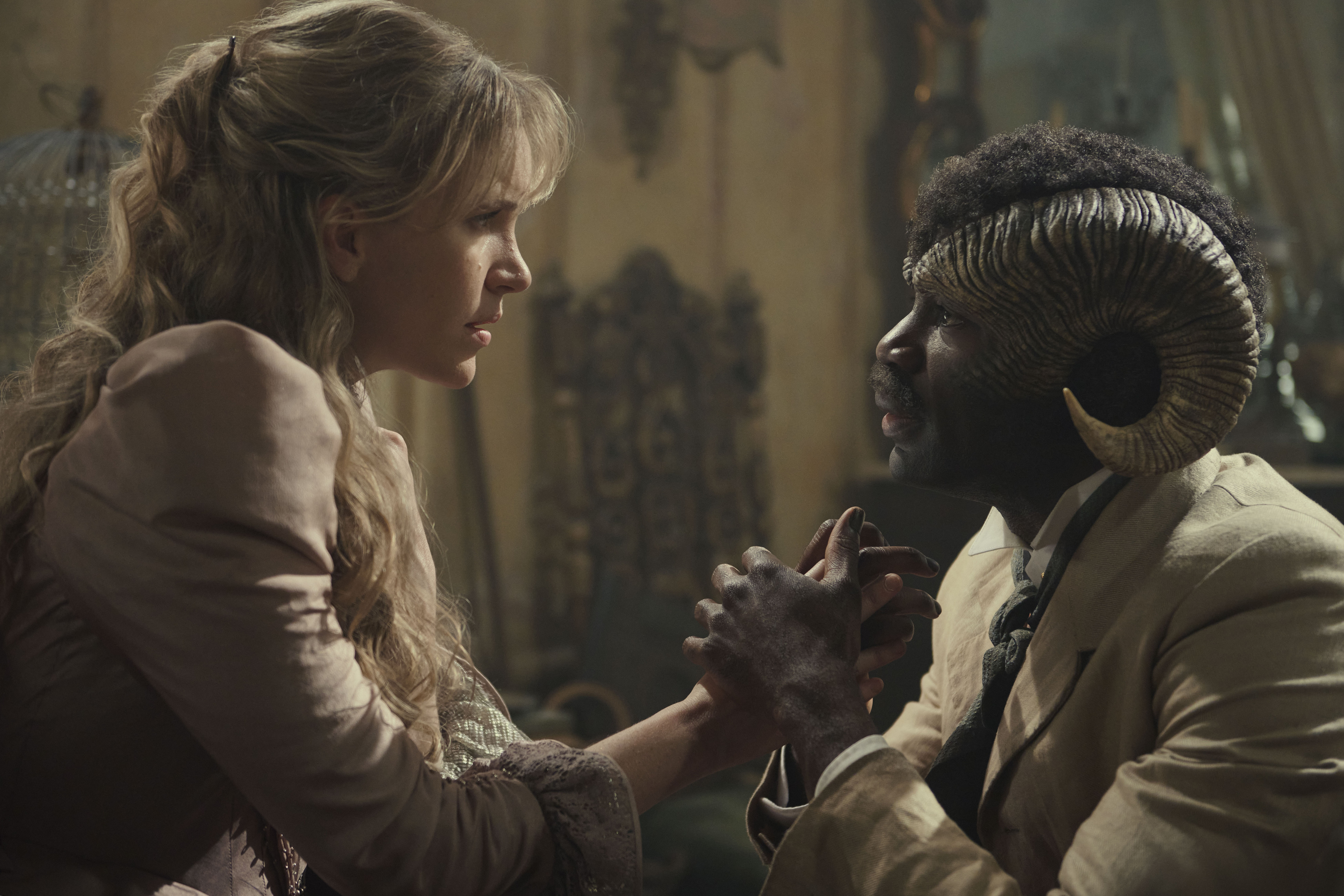 David Gyasi and Tamzin Merchant in Carnival Row (2019)