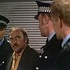 Johnny Allan, Michael Byrne, Don Henderson, and David Neilson in Strangers (1978)