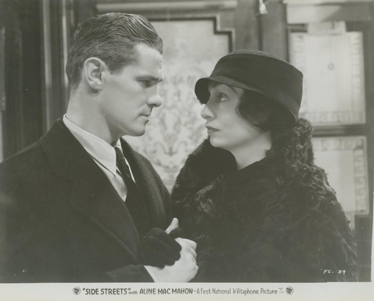 Paul Kelly and Aline MacMahon in Side Streets (1934)