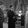 Edward G. Robinson, Maxie Rosenbloom, and Claire Trevor in The Amazing Dr. Clitterhouse (1938)