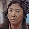 Ko Du-shim in Dongbaekkkot pil muryeop (2019)