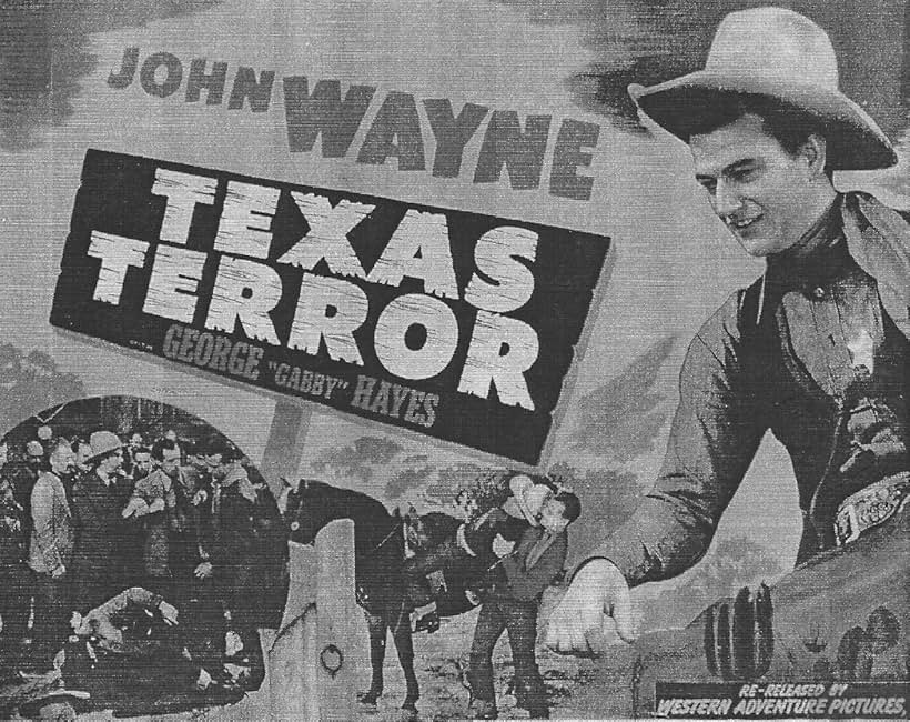 John Wayne and LeRoy Mason in Texas Terror (1935)