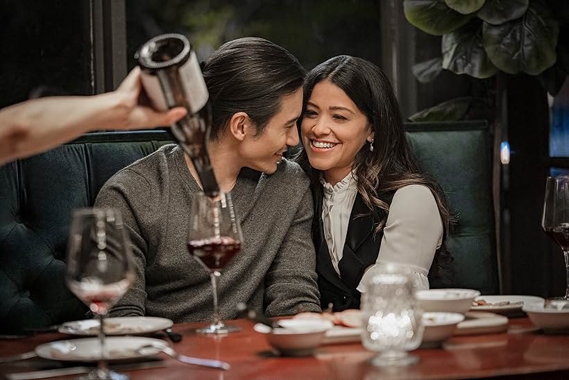 Gina Rodriguez and Manny Jacinto in I Want You Back (2022)