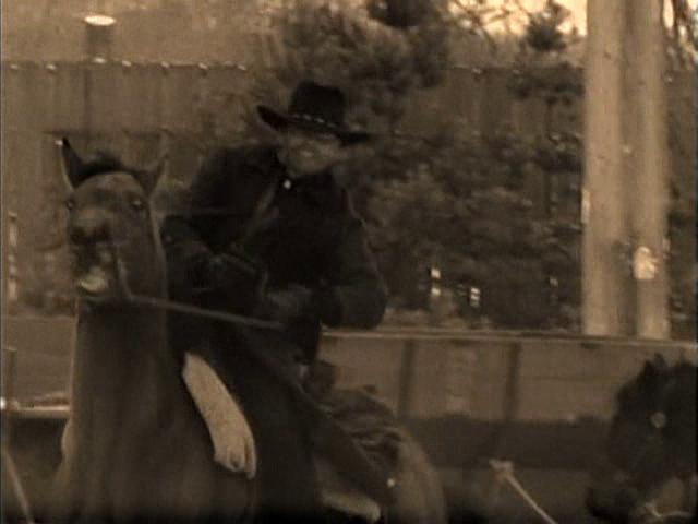 Kent Shelton gets the hell outta town on his faithful steed Togo in an episode of "The Untouchables" TV series.