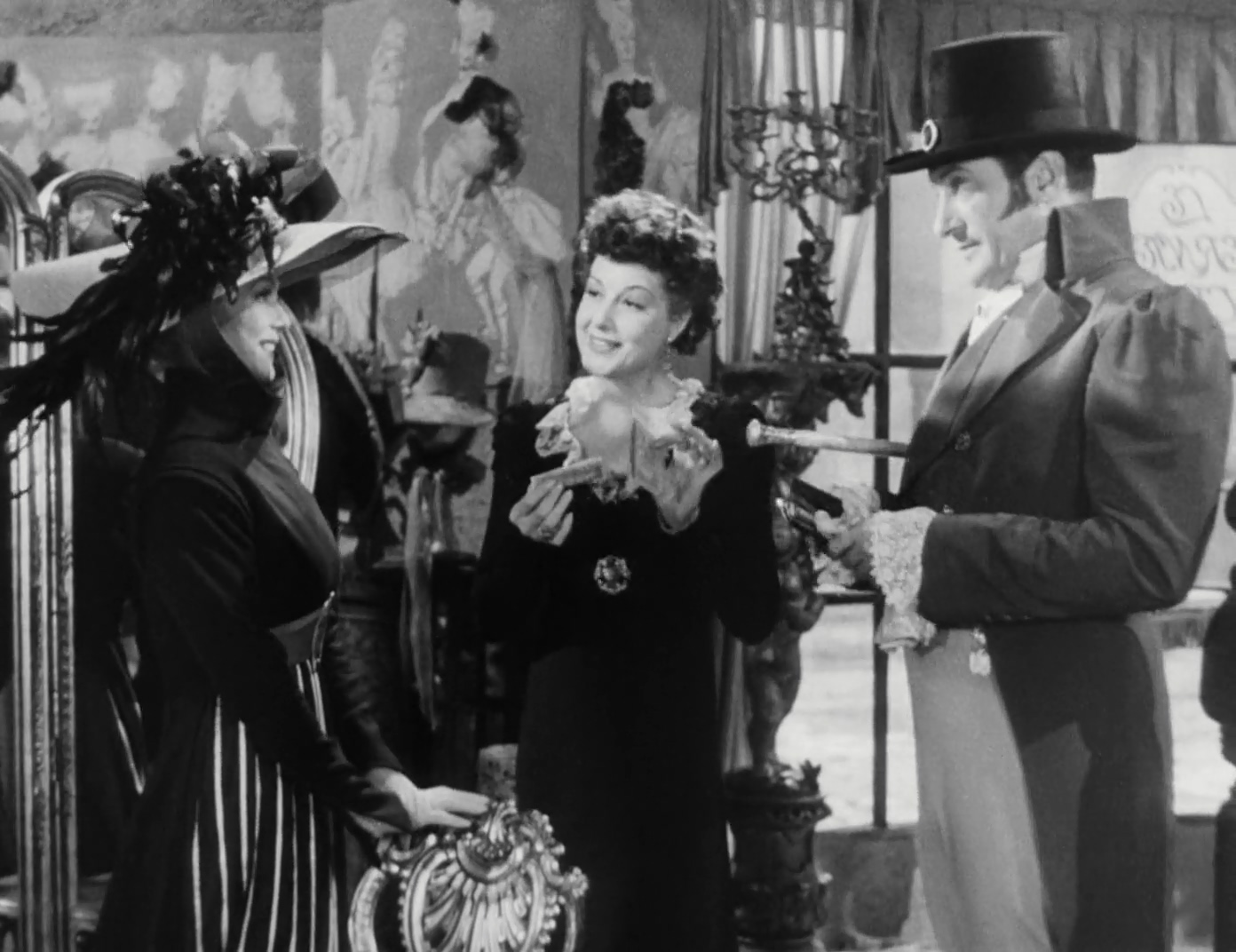 George Sanders, Carole Landis, and Leona Maricle in A Scandal in Paris (1946)