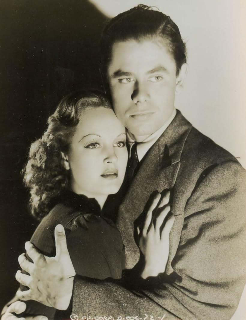 Glenn Ford and Rochelle Hudson