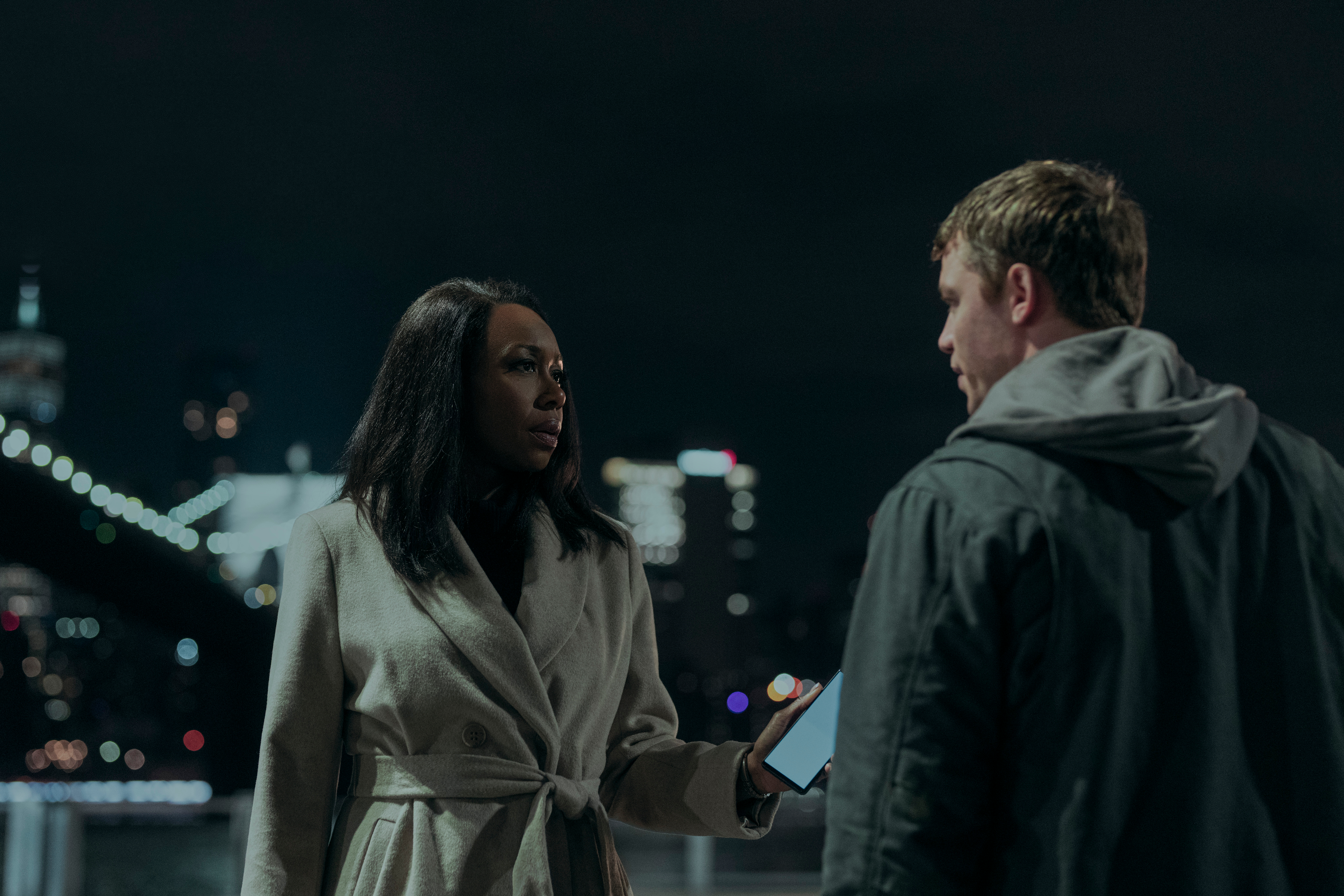 Amanda Warren and Gabriel Basso in The Night Agent (2023)