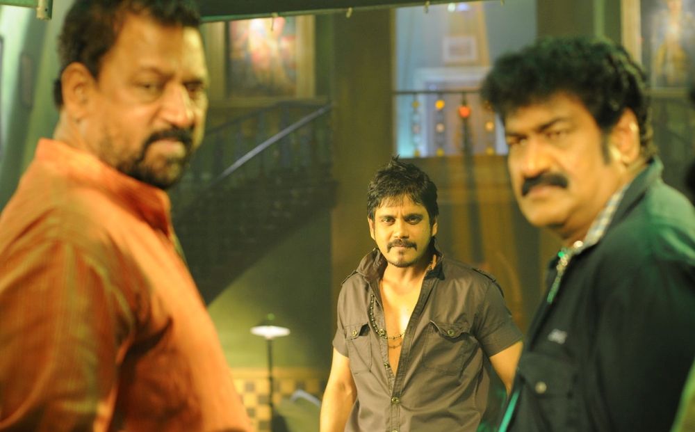 Nagarjuna Akkineni and Raghu Babu in Bhai (2013)