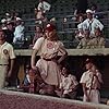 Geena Davis, Tom Hanks, Renée Coleman, and Freddie Simpson in A League of Their Own (1992)