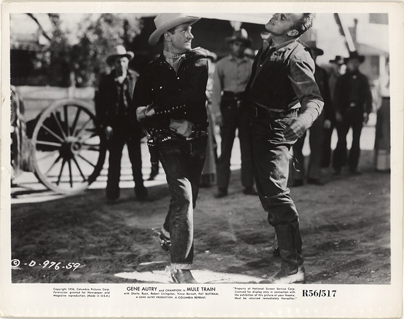 Gene Autry and Gregg Barton in Mule Train (1950)