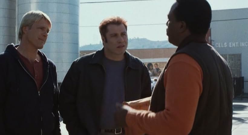 John Travolta, Wesley Thompson, and Tom Nolan in White Man's Burden (1995)