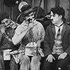 Charles Chaplin, Albert Austin, and Leo White in Behind the Screen (1916)