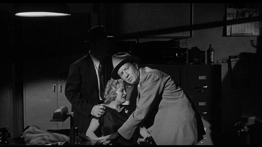 Cleo Moore and Eddie Parker in Over-Exposed (1956)