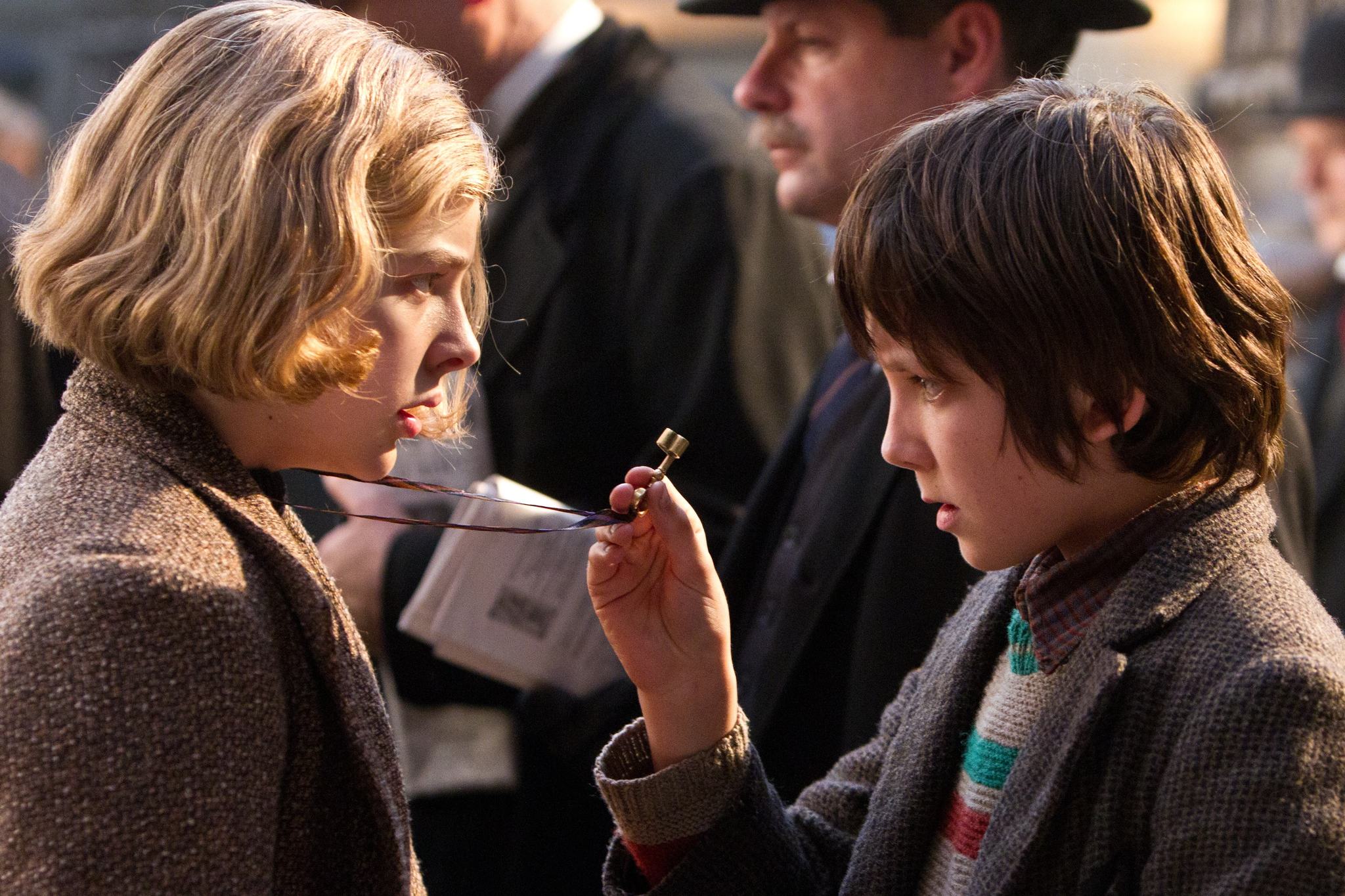 Chloë Grace Moretz and Asa Butterfield in Hugo (2011)