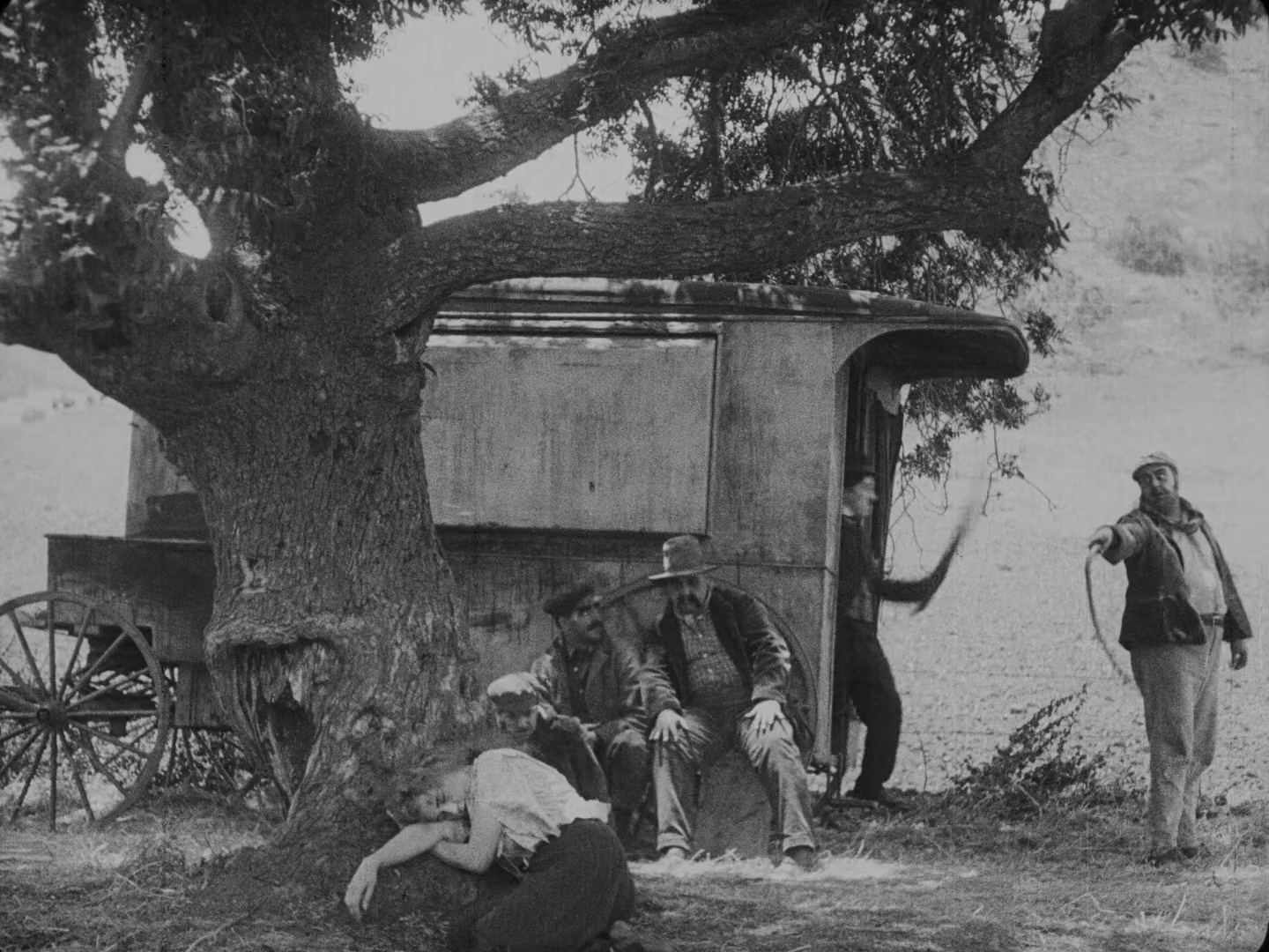 Charles Chaplin, Eric Campbell, Frank J. Coleman, and Edna Purviance in The Vagabond (1916)