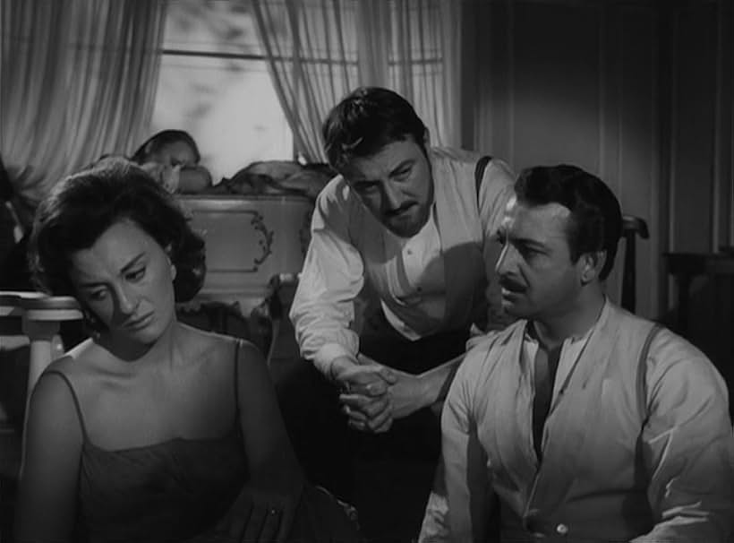 César del Campo, Lucy Gallardo, and Enrique Rambal in The Exterminating Angel (1962)