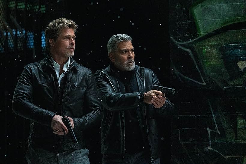 Brad Pitt and George Clooney in Wolfs (2024)