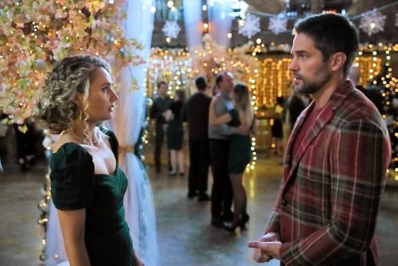 Brant Daugherty and Clare Bowen in #Xmas (2022)