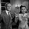 Doris Merrick and Arthur Space in The Big Noise (1944)