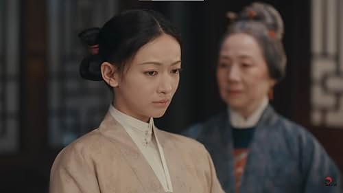 Qunzhi Kang and Jinyan Wu in Episode #1.21 (2022)