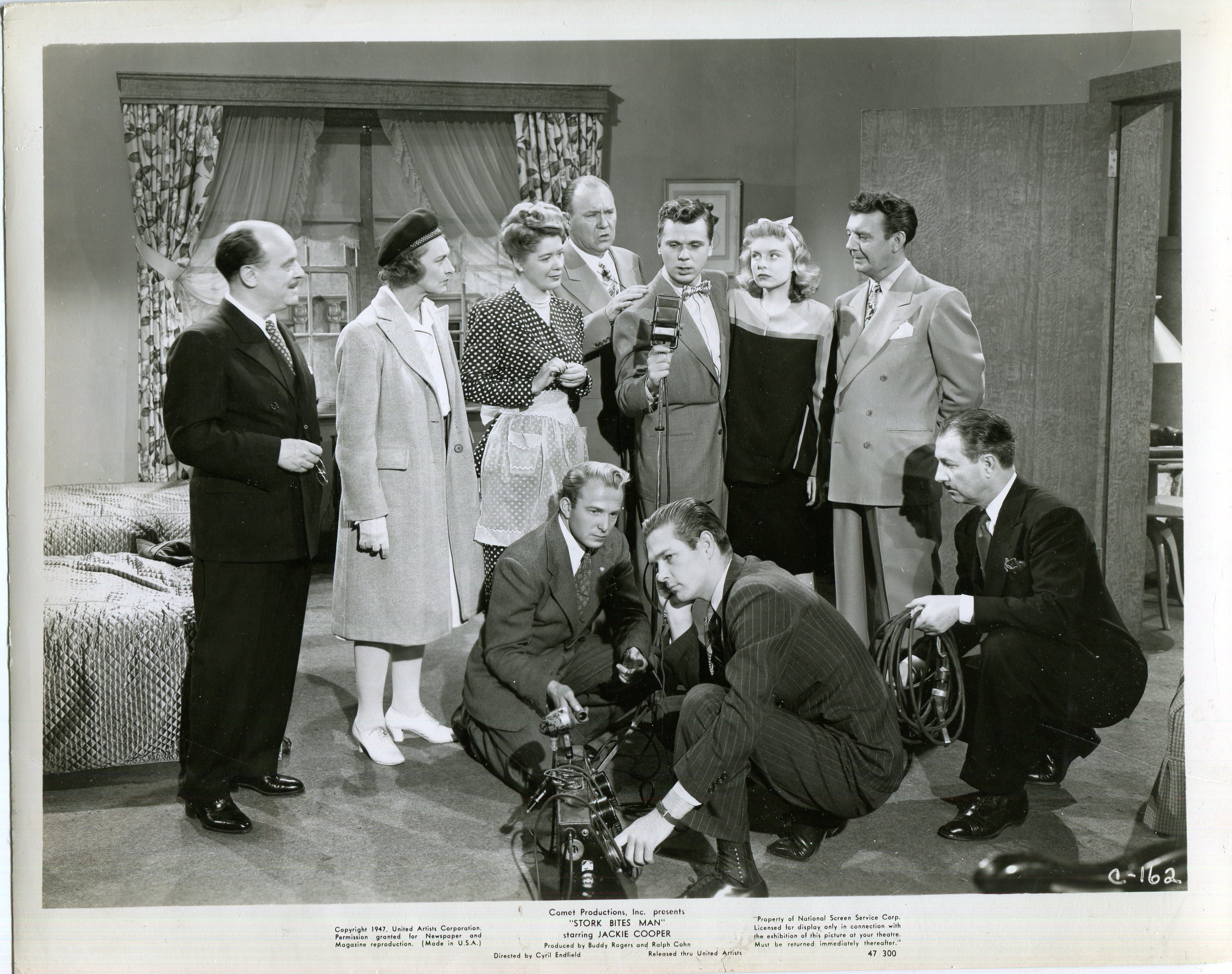 Marjorie Beckett, Jackie Cooper, Scott Elliott, Alvin Hammer, Emory Parnell, Ralph Peters, Meg Randall, Gus Schilling, and Sarah Selby in Stork Bites Man (1947)