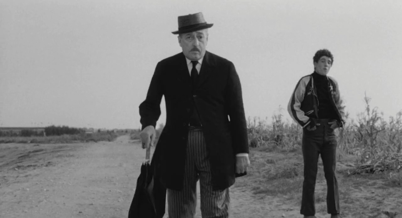 Ninetto Davoli and Totò in The Hawks and the Sparrows (1966)