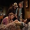 James Arness, Harry Carey Jr., Victor French, and Pat Thompson in Gunsmoke (1955)