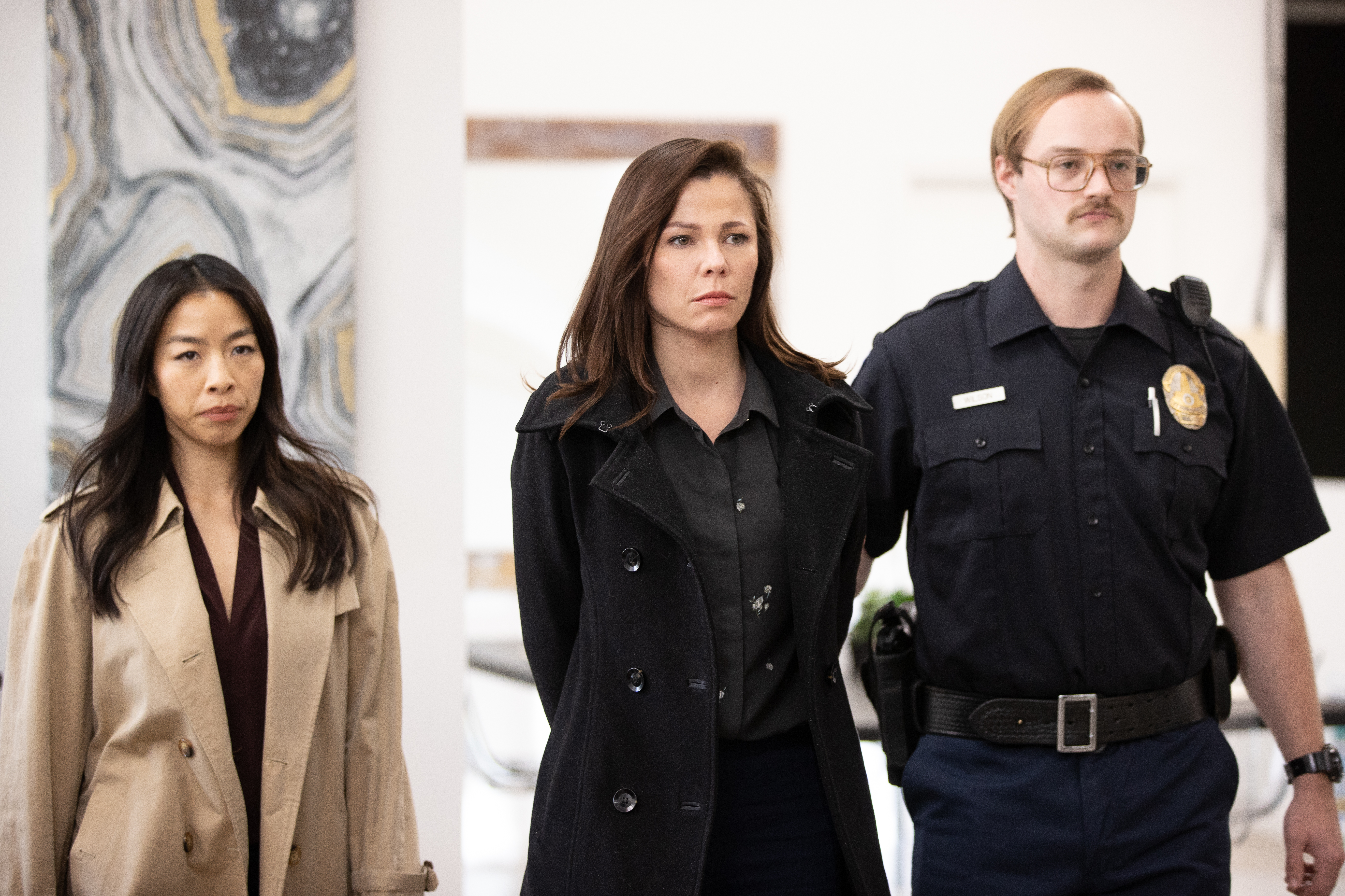 Anita Leeman Torres, Jennifer Khoe, and Michael Emmett Sempek in A Dangerous Defense (2021)