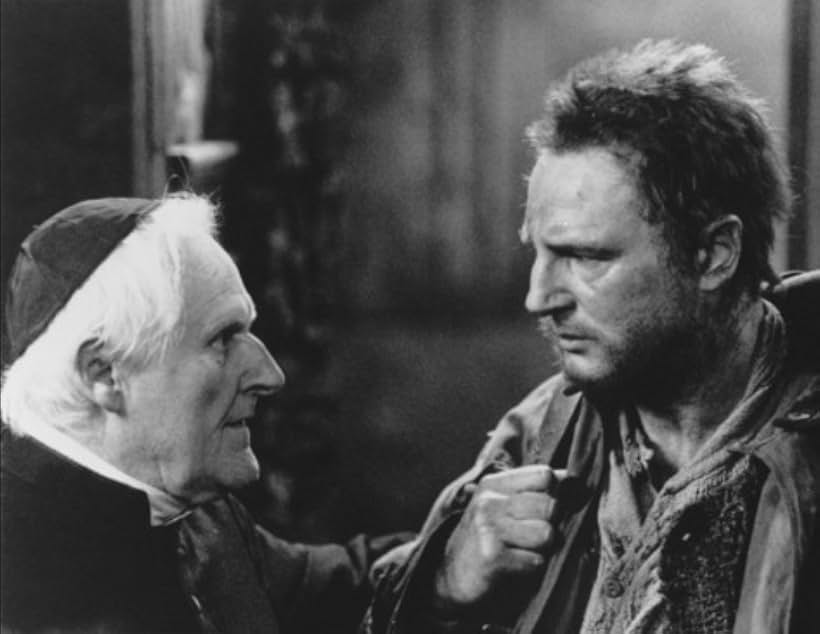 Liam Neeson and Peter Vaughan in Les Misérables (1998)