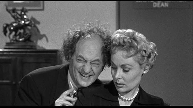 Larry Fine and Angela Stevens in Blunder Boys (1955)