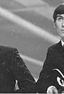 Paul McCartney, George Harrison, and The Beatles in The Beatles: Twist and Shout - The Ed Sullivan Show (1964)