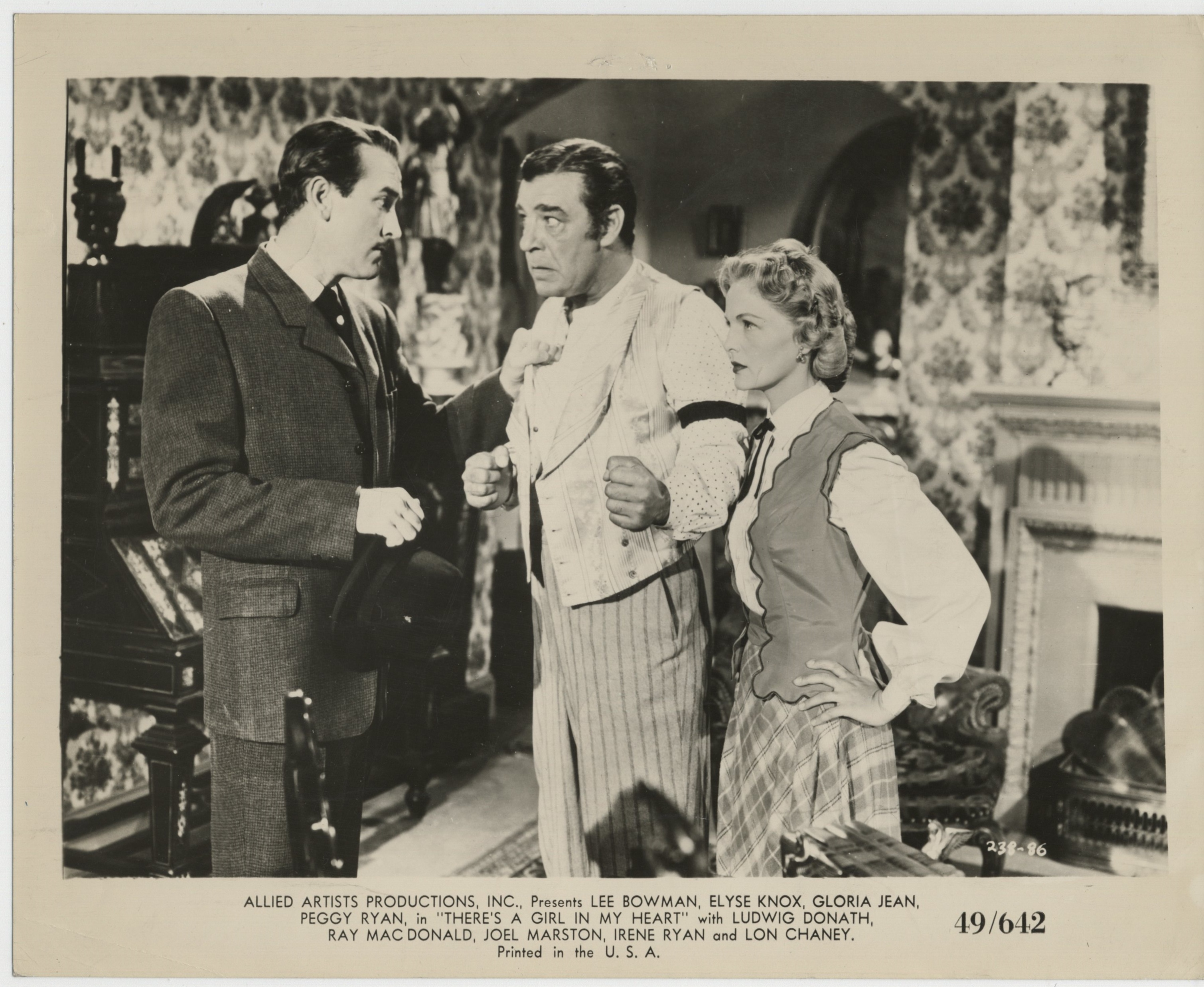 Lon Chaney Jr., Lee Bowman, and Elyse Knox in There's a Girl in My Heart (1949)