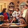 John Goodman, Roseanne Barr, Sara Gilbert, Michael Fishman, Alicia Goranson, and Laurie Metcalf in Roseanne (1988)