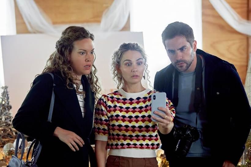 Anna Van Hooft, Brant Daugherty, and Clare Bowen in #Xmas (2022)