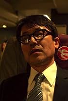 Yoshiaki Kobayashi in Contagion (2011)