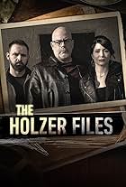 Dave Schrader, Cindy Kaza, and Shane Pittman in The Holzer Files (2019)