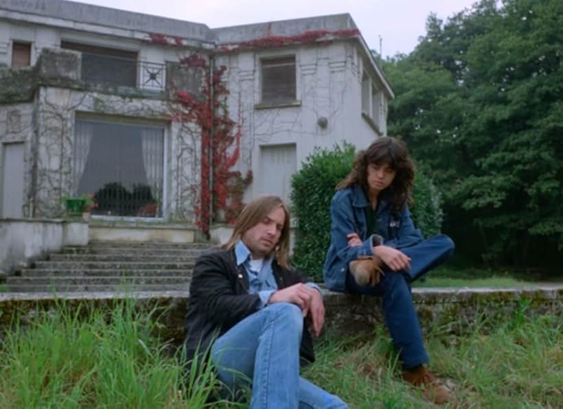 Joe Dallesandro and Maria Schneider in Merry-Go-Round (1980)