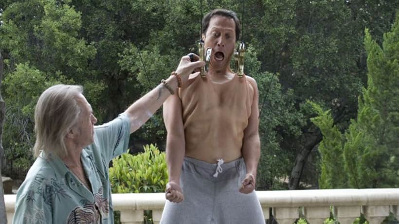 David Carradine and Rob Schneider in Big Stan (2007)