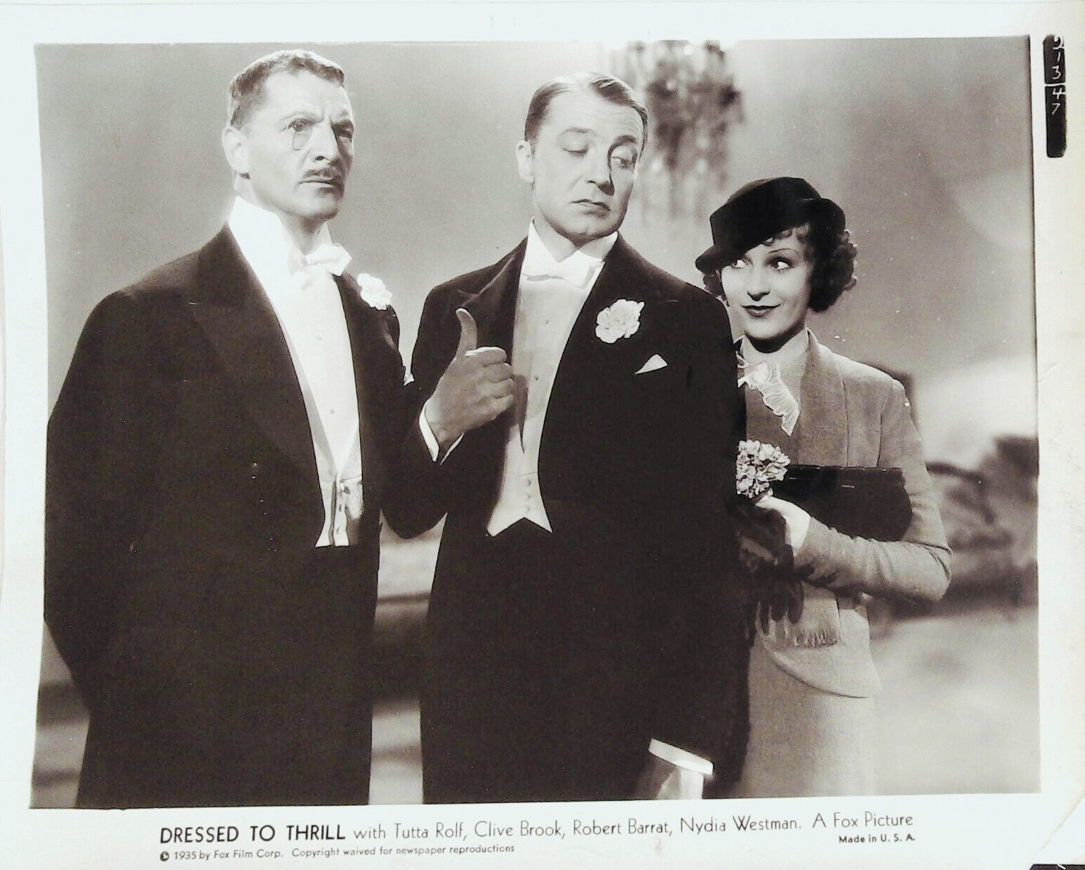 Robert Barrat and Clive Brook in Dressed to Thrill (1935)