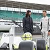 Keanu Reeves and Jenson Button in Brawn: The Impossible Formula 1 Story (2023)