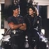 Sandra Bullock and Sylvester Stallone in Demolition Man (1993)