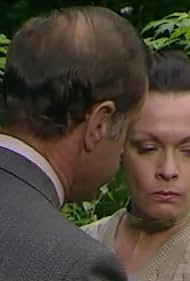 Meg Davies and Geoffrey Palmer in Death of an Expert Witness (1983)