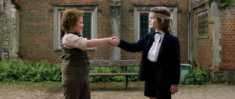 Hector Bateman-Harden and Codie-Lei Eastick in Holmes & Watson (2018)