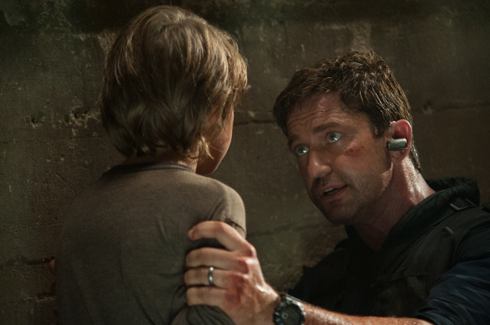 Finley Jacobsen and Gerard Butler in FilmDistrict's OLYMPUS HAS FALLEN.