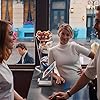 Ryan Gosling, Emma Stone, and Olivia Hamilton in La La Land (2016)