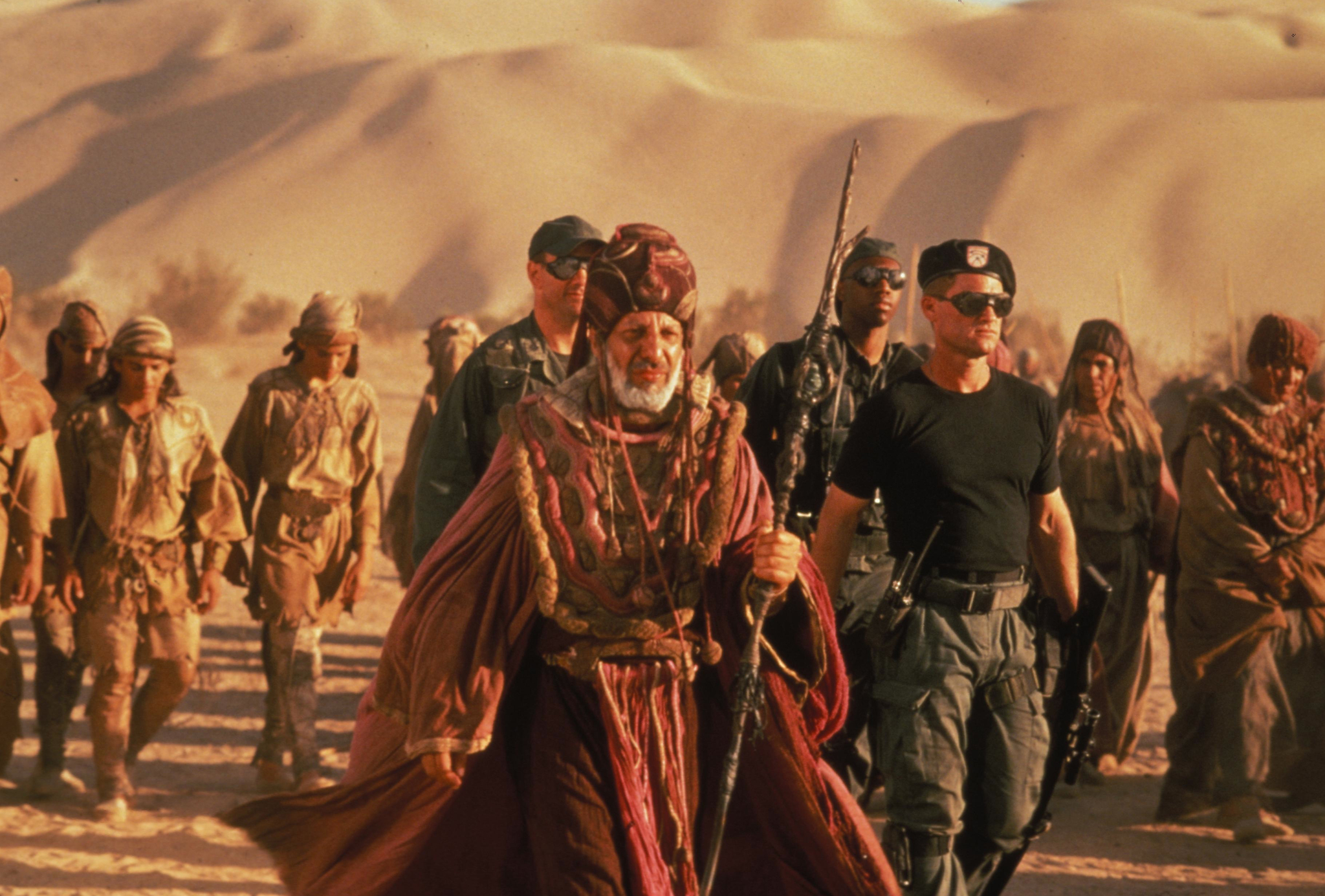 Kurt Russell, Erick Avari, John Diehl, and Derek Webster in Stargate (1994)