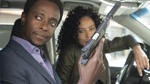 Tawny Cypress and Edi Gathegi in The Blacklist: Redemption (2017)