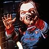 Brad Dourif, Ed Gale, and Hunter Marks in Child's Play (1988)