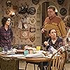 John Goodman, Roseanne Barr, Sara Gilbert, and Laurie Metcalf in Roseanne (1988)